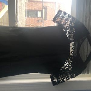 Leather dress size 14 perfect for a petite girl not necessarily for a young girl